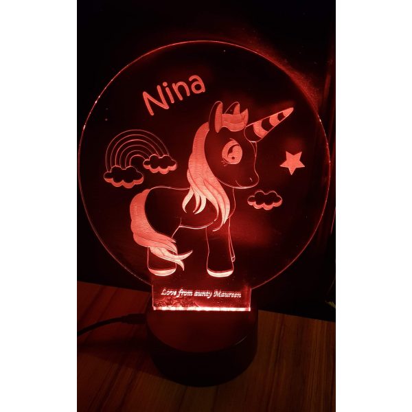 Personalised unicorn light feature with light base, with name Nina on it at the top