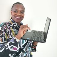 Yejide Adeoye holding a laptop